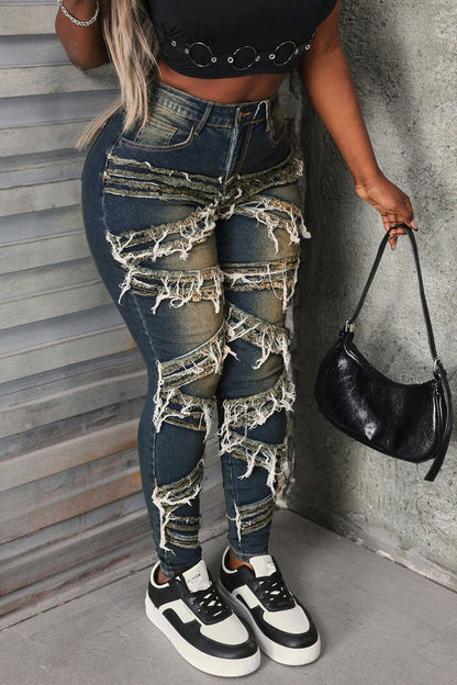 Whiskered Stretch Patch Skinny Jeans
